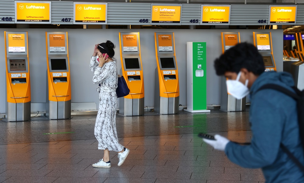 Passengers rush past check-in desks prior to the first Lufthansa charter flight for Tianjin, China after the lockdown, at the airport in Frankfurt May 29, 2020. u00e2u20acu2022 Reuters pic