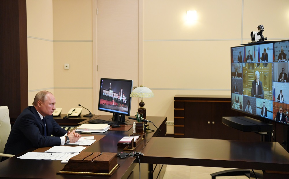 Russian President Vladimir Putin delivers a televised address to the nation about the Covid-19 outbreak, at the Novo-Ogaryovo state residence outside Moscow May 11, 2020. u00e2u20acu2022 Handout via Reuters