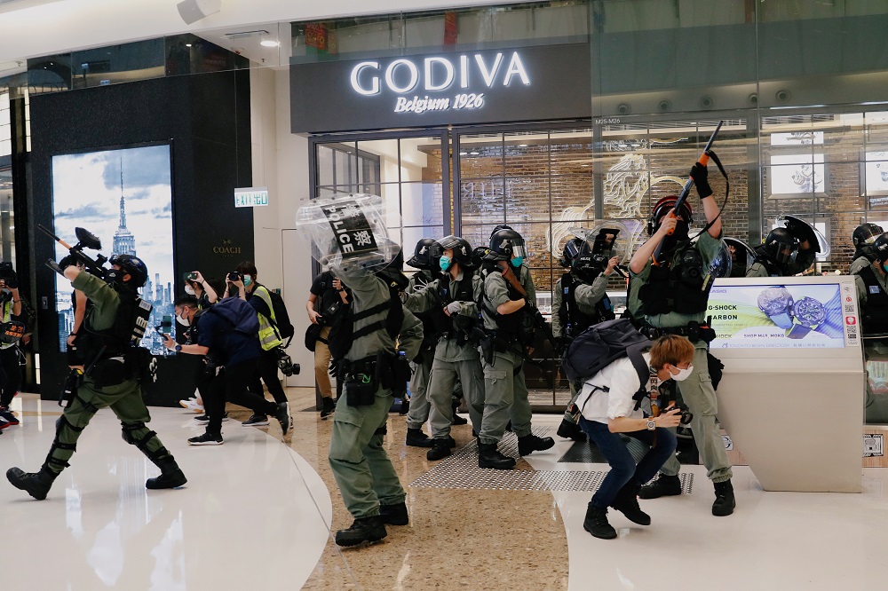 Riot police raise their pepper spray projectile inside a shopping mall as they disperse anti-government protesters during a rally, in Hong Kong May 10, 2020. u00e2u20acu2022 Reuters pic