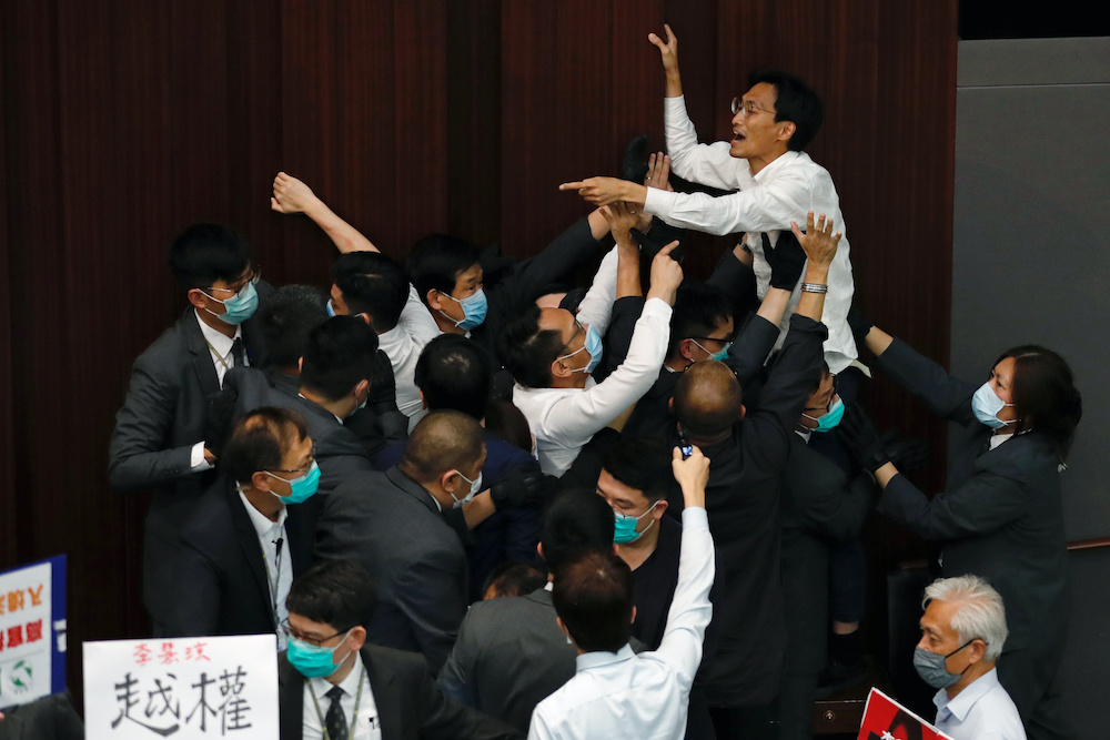 Pan-democratic legislator Eddie Chu Hoi-dick scuffles with security and pro-China legislators during Legislative Councilu00e2u20acu2122s House Committee meeting, in Hong Kong, China May 8, 2020. u00e2u20acu201d  Reuters pic