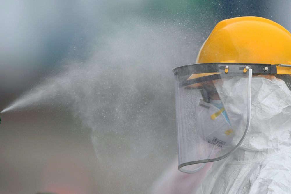 Medical staff is sprayed with disinfectant amid the spread of the coronavirus disease in Jakarta, Indonesia April 30, 2020. u00e2u20acu201d Reuters pic