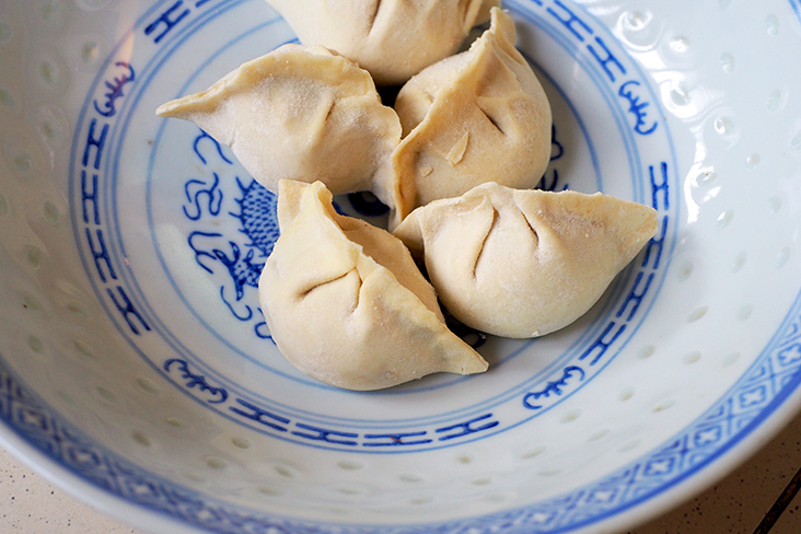 The handmade dumplings are frozen in packets so just take them out to boil.