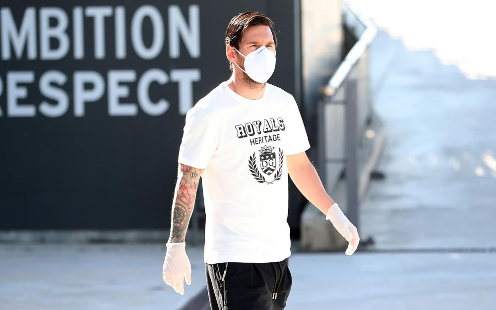 This handout image released by FC Barcelona May 6, 2020 shows Barcelona’s Lionel Messi wearing a face mask and gloves at the Ciutat Esportiva Joan Gamper in Sant Joan Despi near Barcelona. — Miguel Ruiz/FC Barcelona handout pic via AFP