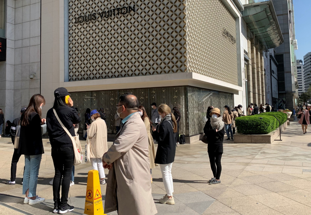 People queue to enter the Chanel boutique at a department store amid the Covid-19 outbreak, in Seoul, South Korea, May 13, 2020. u00e2u20acu201d Reuters pic 