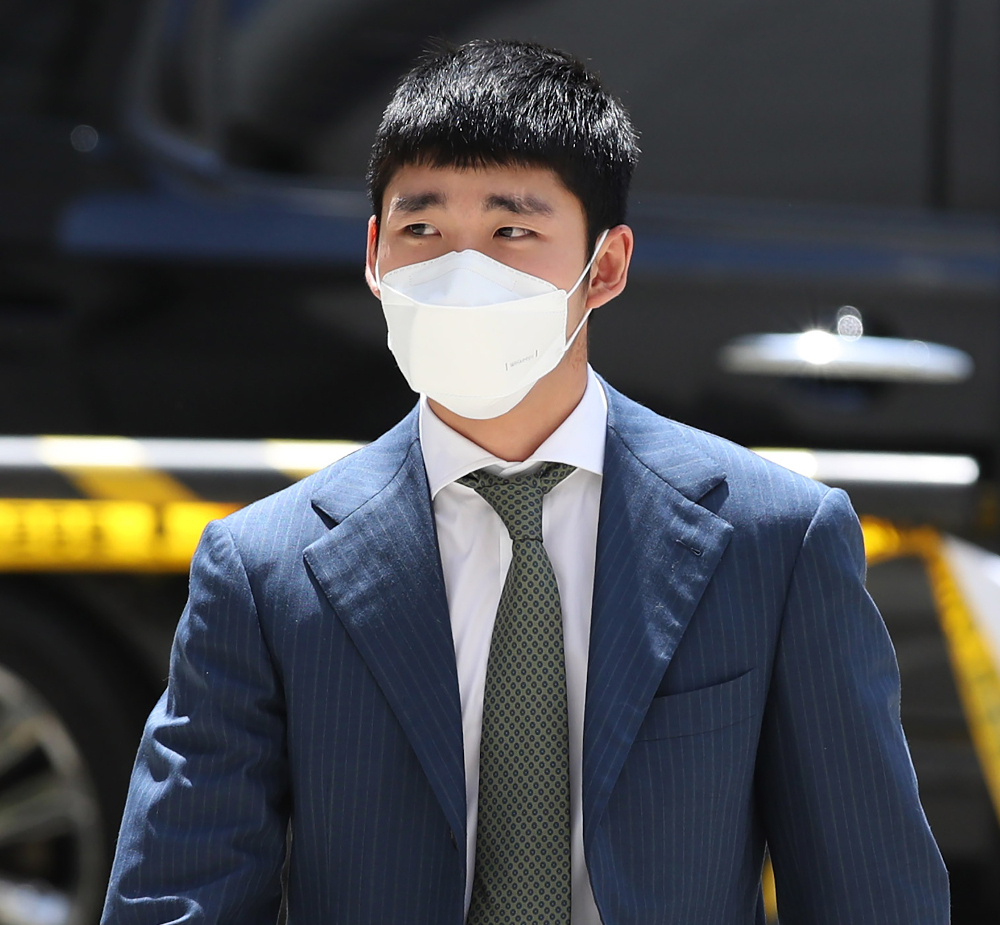 South Korean Olympic skating champion Lim Hyo-jun wearing a face mask arrives for his trial over sexual harassment at Seoul Central District Court in Seoul May 7, 2020. u00e2u20acu201d Yonhap handout pic via AFP 