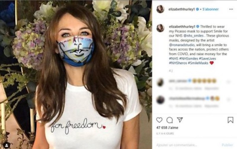 Elizabeth Hurley wearing a Picasso-inspired mask by Ron Arad. u00e2u20acu201d AFP-Relaxnews pic