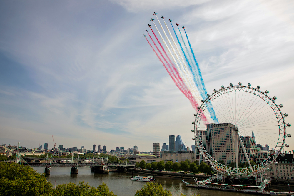 The British Royal Air Force Red Arrows conduct a fly past over London to commemorate the 75th Anniversary of Victory in Europe (VE75) in Britain May 8, 2020. u00e2u20acu201d Reuters picnn