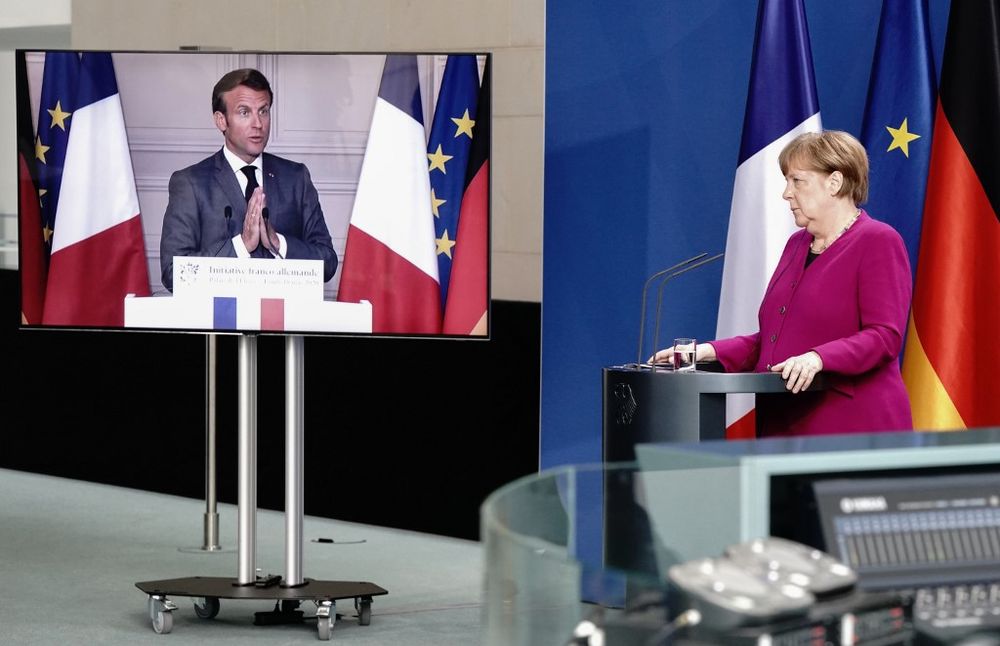 German Chancellor Angela Merkel listens during a joint press conference with French President Emmanuel Macron, who attends via video link, at the Chancellery in Berlin, Germany, May 18, 2020 on the effects of the novel coronavirus pandemic. u00e2u20acu201d AFP pic