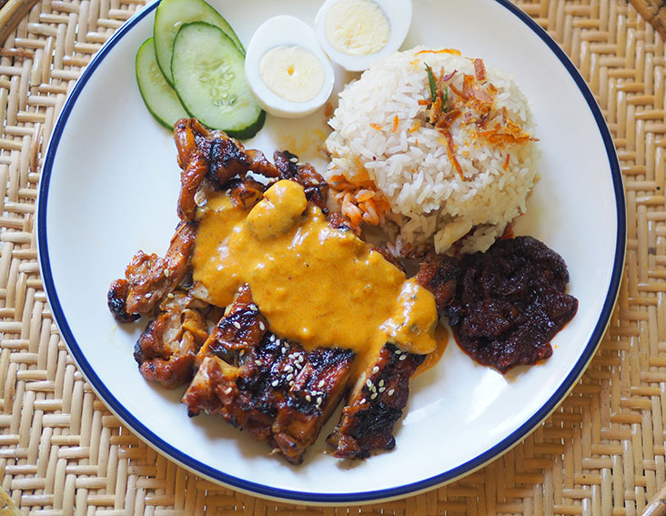 Creamy sauce with spices paired with a piece of 'ayam bakar' are the winners for this Nasi Lemak Ayam Bakar NALE order