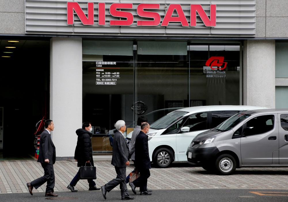 People walk past a dealer shop of Nissan Motor in Tokyo, Japan, February 12, 2019. u00e2u20acu201d Reuters pic 