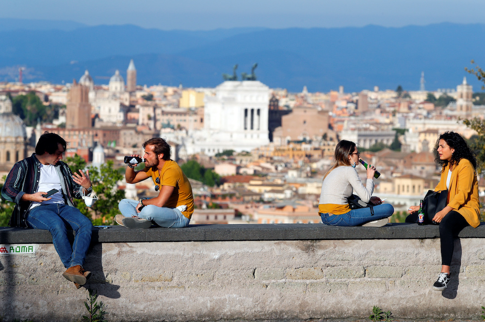 People enjoy drinks at the Gianicolo hill, amid the coronavirus disease outbreak, in Rome, Italy, May 8, 2020. — Reuters pic