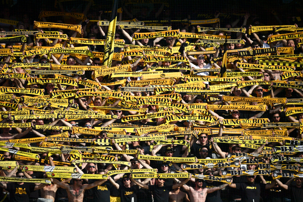 In this file photo taken April 22, 2018, supporters of the Swiss football club BSC Young Boys celebrate during the Swiss Super League football match Young Boys against Lausanne-Sport at the stade de Suisse in Bern. u00e2u20acu201d AFP pic 