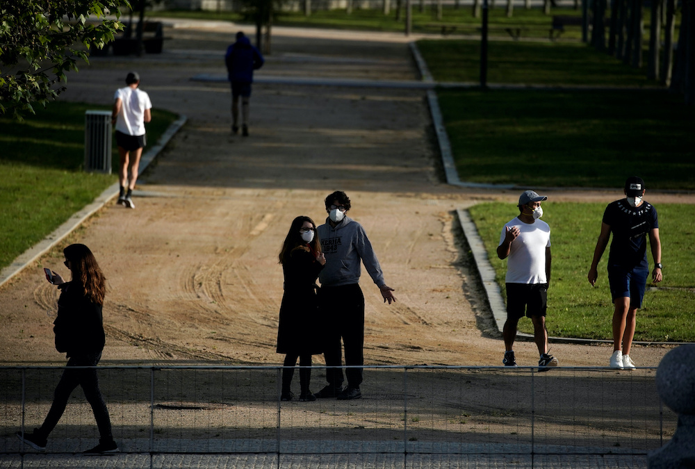 People walk in Madrid Rio park, during the hours allowed for individual exercise, for the first time since the lockdown was announced on March 14, amid the coronavirus disease outbreak, in Madrid, Spain, May 2, 2020. u00e2u20acu201dReuters picnn