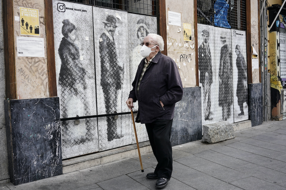 A man wearing a protective face mask walks during the hours allowed for elderly people to walk, for the first time since the lockdown was announced on March 14, amid the coronavirus disease outbreak, in Madrid, Spain, May 2, 2020. u00e2u20acu201d Reuters picnn