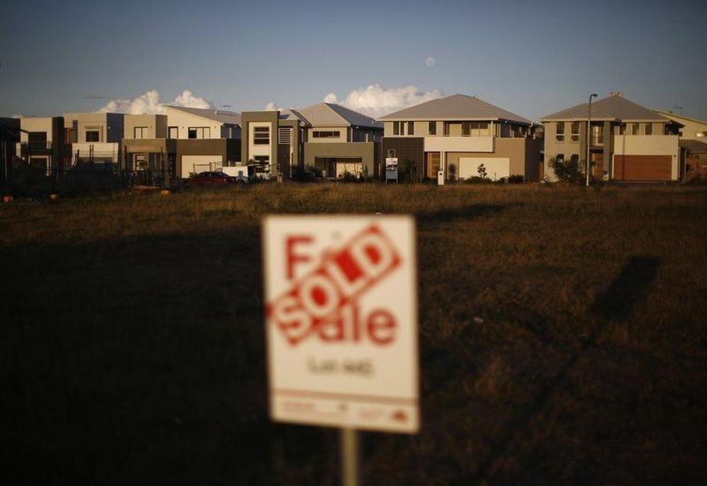 A row of newly-constructed homes selling for over one million dollars each are pictured in the new Sydney suburb of Greenhills Beach, May 13, 2014. u00e2u20acu201d Reuters pic