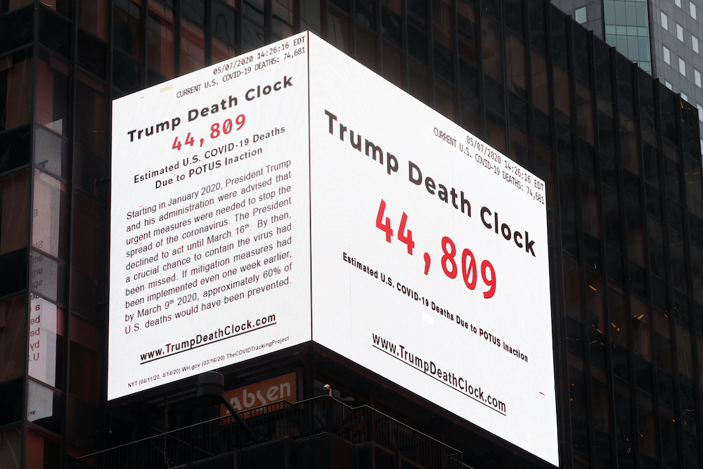 A large sign in the Times Square neighbourhood displays a message connecting US President Donald Trump to deaths due to the ongoing national outbreak of the coronavirus disease in the Manhattan borough of New York US, May 8, 2020. — Reuters pic
