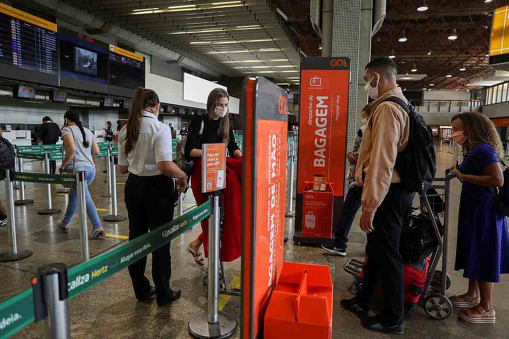 People walk at GOL Airlines check-in area at Guarulhos International Airport amid the outbreak of Covid-19, in Guarulhos, near Sao Paulo, Brazil May 19, 2020.u00e2u20acu201d Reuters pic