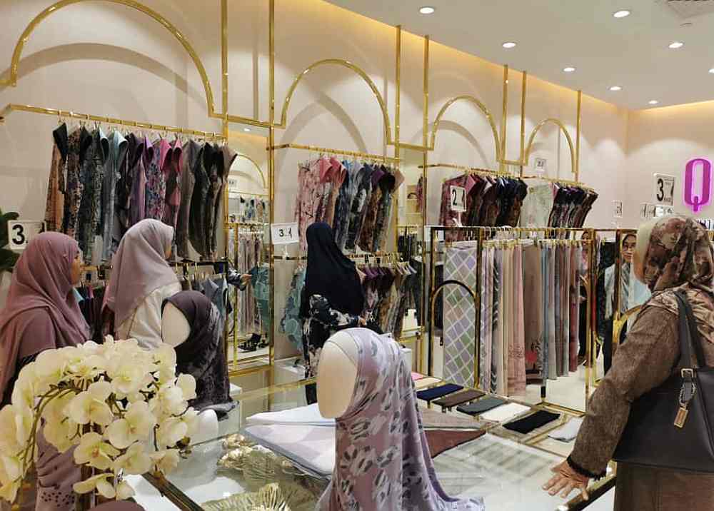 Muslim apparel stores are working hard to push sales during this Raya season, with customers reluctant to go out shopping. u00e2u20acu201d Picture courtesy of Qaira Holdings Sdn Bhd