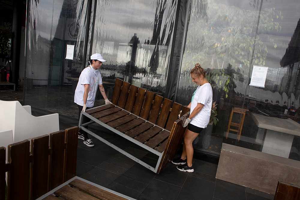 Cafe staff set up furniture in the wake of New Zealand easing strict regulations implemented to curb the spread of Covid-19 in Auckland, New Zealand April 28, 2020. u00e2u20acu201d Reuters pic