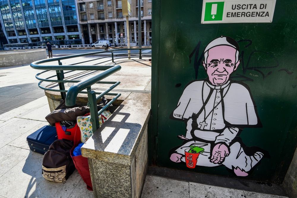A view shows u00e2u20acu02dcPope Francis Clochardu00e2u20acu2122, an artwork part of a series by Italian pop artist and activist aleXsandro Palombo entitled u00e2u20acu02dcCaritasu00e2u20acu2122 on new poverty and solidarity amid the coronavirus crisis, on May 21, 2020 in Milan,