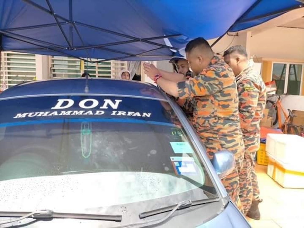 Firefighters rescued a boy after he was found locked inside his parentsu00e2u20acu2122 car at a house in Batu Gajah May 26, 2020. u00e2u20acu201d Picture via Facebook