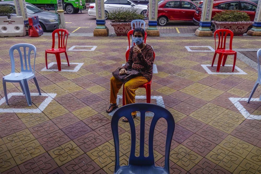 A woman adheres to social distancing guidelines in Kuala Lumpur May 12, 2020.u00e2u20acu201d Picture by Shafwan Zaidon