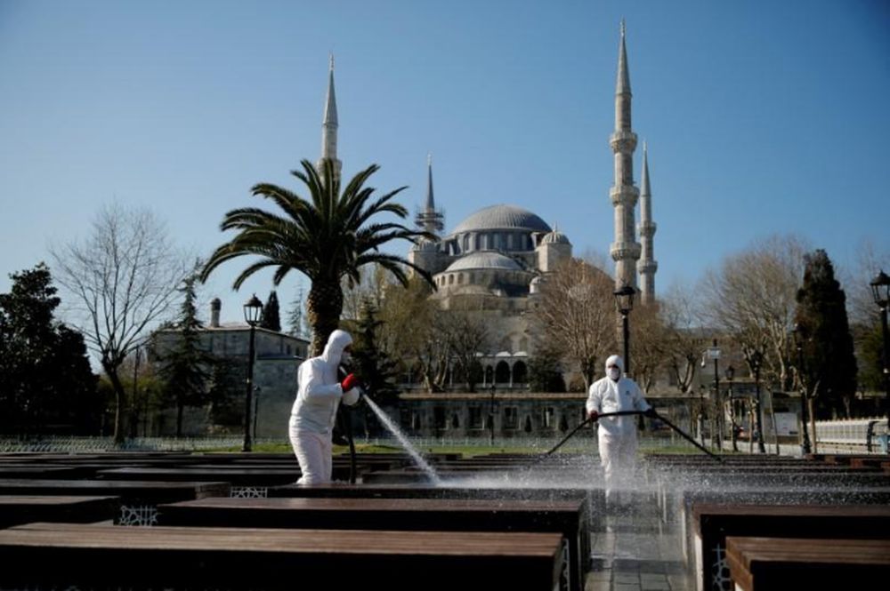 Workers in protective suits disinfect the park in front of the Blue Mosque in response to the spread of coronavirus disease (Covid-19) in Istanbul, Turkey March 21, 2020. u00e2u20acu201d Reuters pic