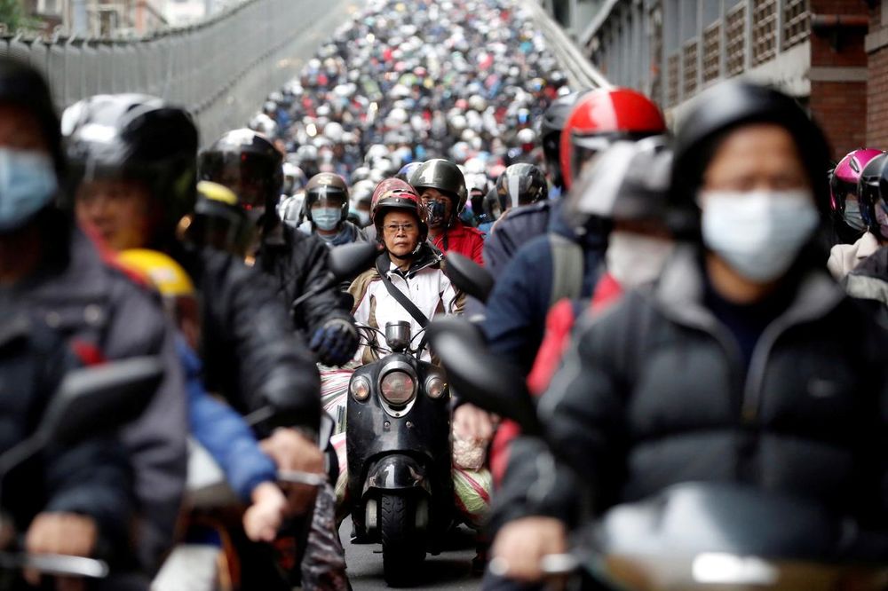 Commuters wear face masks to protect themselves from the coronavirus disease (Covid-19) spread during morning rush hour traffic in Taipei, Taiwan April 8, 2020. u00e2u20acu201d Reuters pic