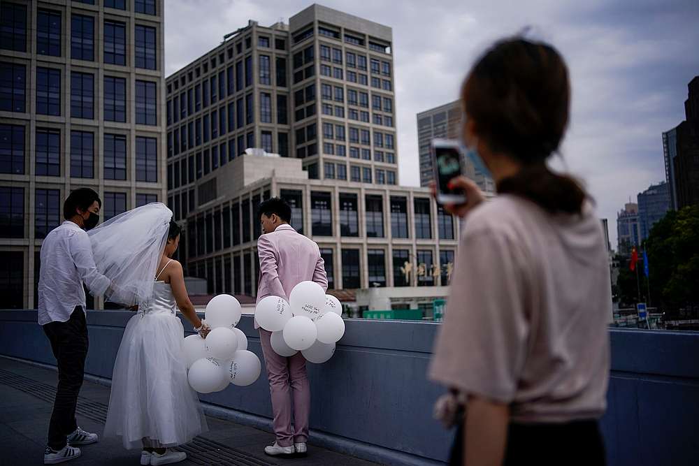 A couple prepares for their wedding photo session, following an outbreak of Covid-19, in Shanghai, China May 25, 2020. u00e2u20acu201d Reuters pic