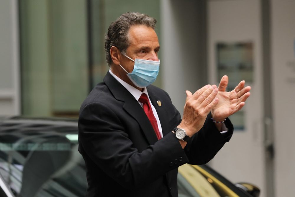 New York Governor Andrew Cuomo arrives at the New York Stock Exchange (NYSE) on the first day that traders are allowed back onto the historic floor of the exchange on May 26, 2020 in New York City. u00e2u20acu201d Getty Images via AFP