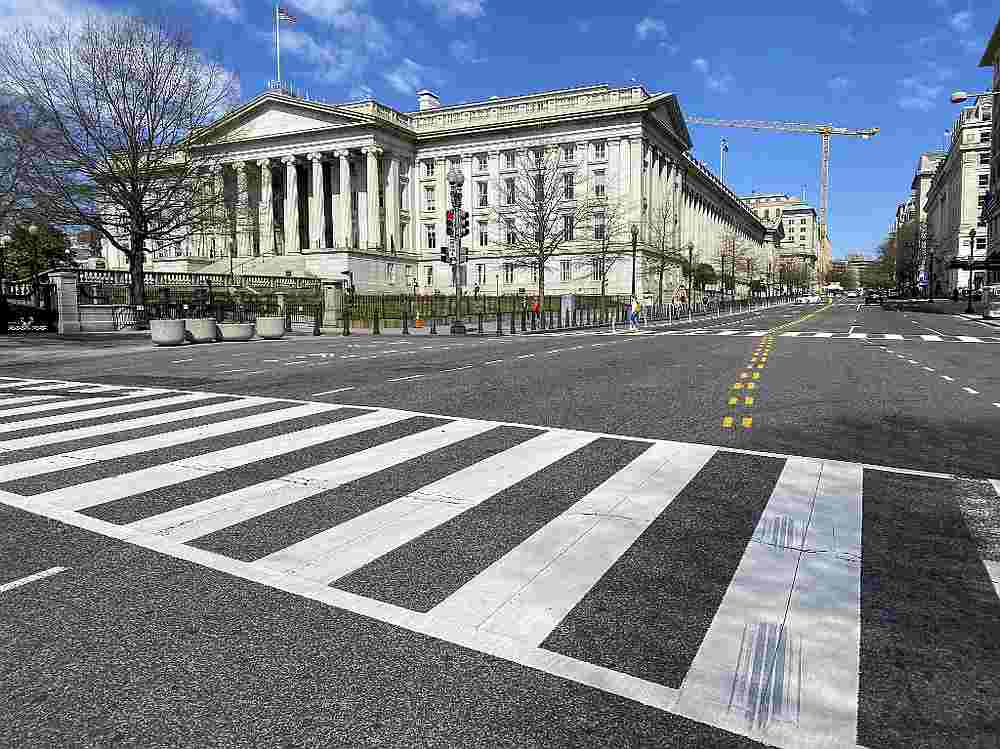 The US Treasury Department building is seen next to an almost empty 15th Street at noon in Washington March 13, 2020. u00e2u20acu201d AFP pic