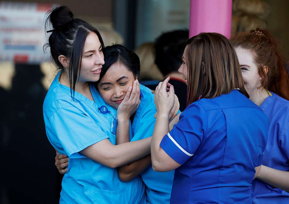 NHS workers react at the Aintree University Hospital during the last day of the Clap for our Carers campaign in support of the NHS, in Liverpool, Britain May 28, 2020. u00e2u20acu201d Reuters pic 