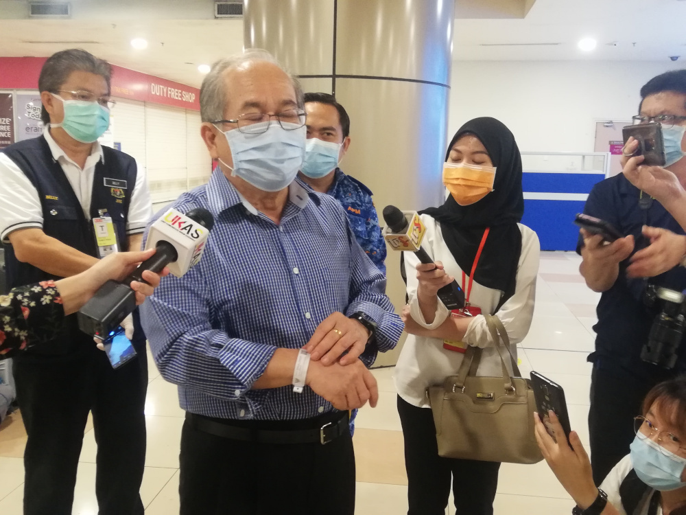 Sarawak Disaster Management Committee (SDMC) chairman Datuk Amar Douglas Uggah speaks to reporters at the Kuching International Airport (KIA) May 1, 2020. u00e2u20acu201d Picture courtesy of Sarawak Public Communications Unit (Ukas)