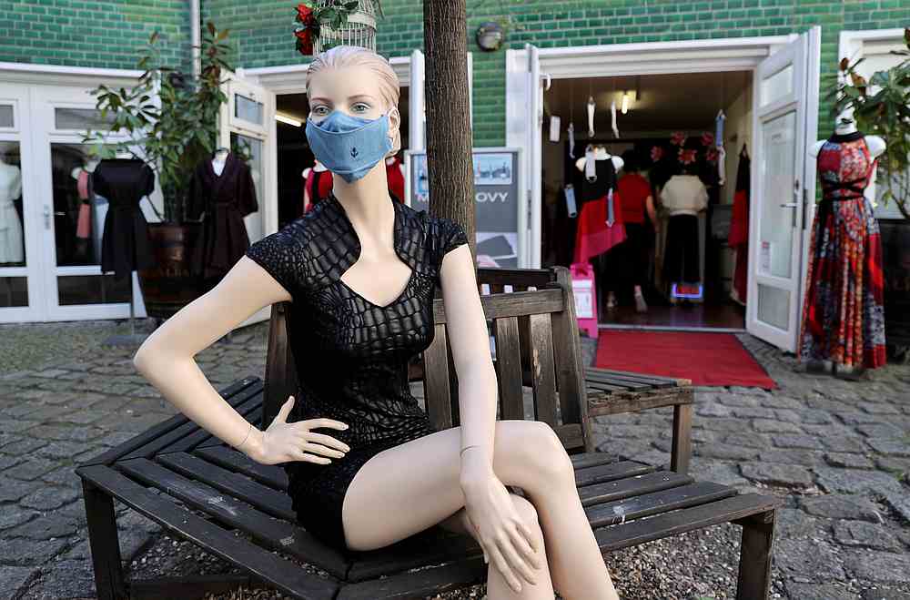 A display dummy with a protective face mask outside 'Moni Novy' fashion shop in Berlin, Germany April 23, 2020. A 'Mask Fashion Week' is being held in Vilnius, Lithuania from May 5, 2020. u00e2u20acu201d Reuters pic