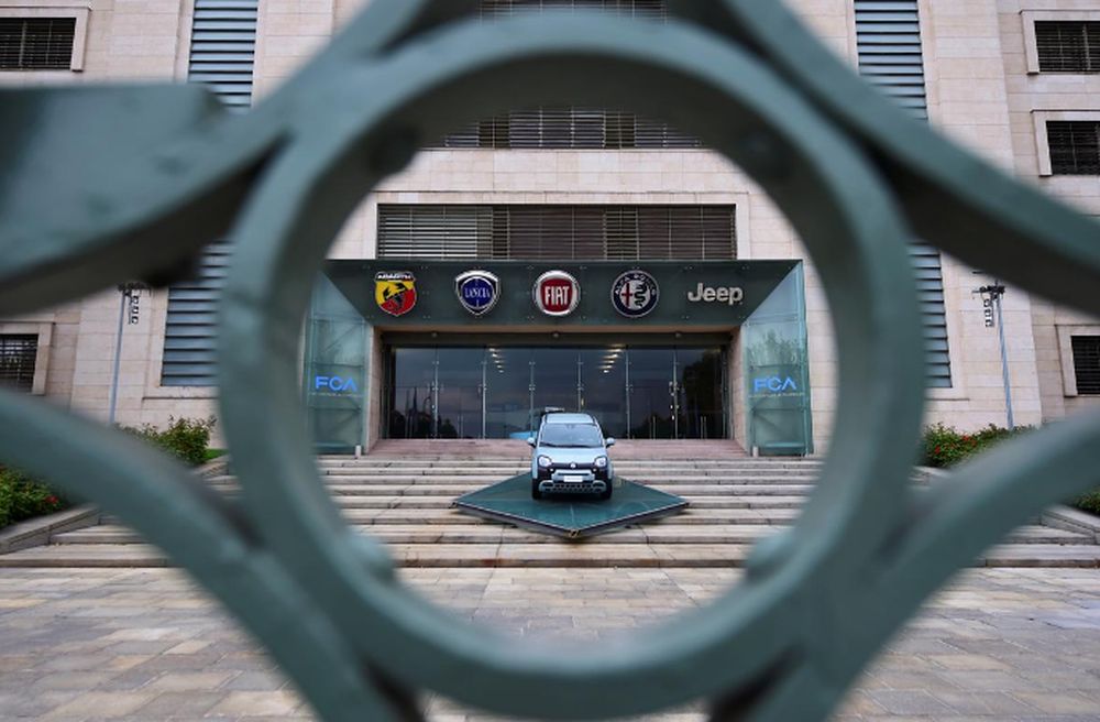 A car is displayed at the entrance of the FCA Italy headquarters, as FCA Mirafiori plant resumed its operations after closure during a lockdown amid the Covid-19 outbreak in Turin, Italy April 27, 2020. u00e2u20acu201d Reuters pic