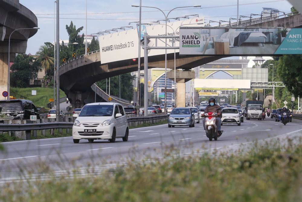 A general view of traffic on the Federal Highway on the first day of the conditional movement control order May 4, 2020. u00e2u20acu201d Picture by Miera Zulyana