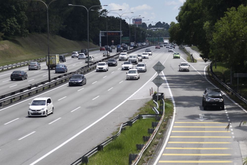 A general view of traffic on the Federal Highway in Shah Alam during the second day of the conditional movement control order May 5, 2020. u00e2u20acu201d Picture by Miera Zulyana