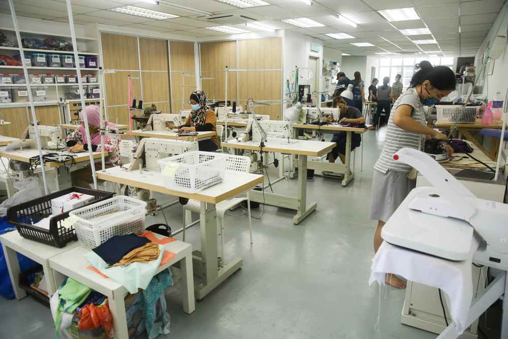 Batik Boutique’s production centre in Kota Damansara can produce up to 1,000 PPE sets per week. — Picture by Choo Choy May