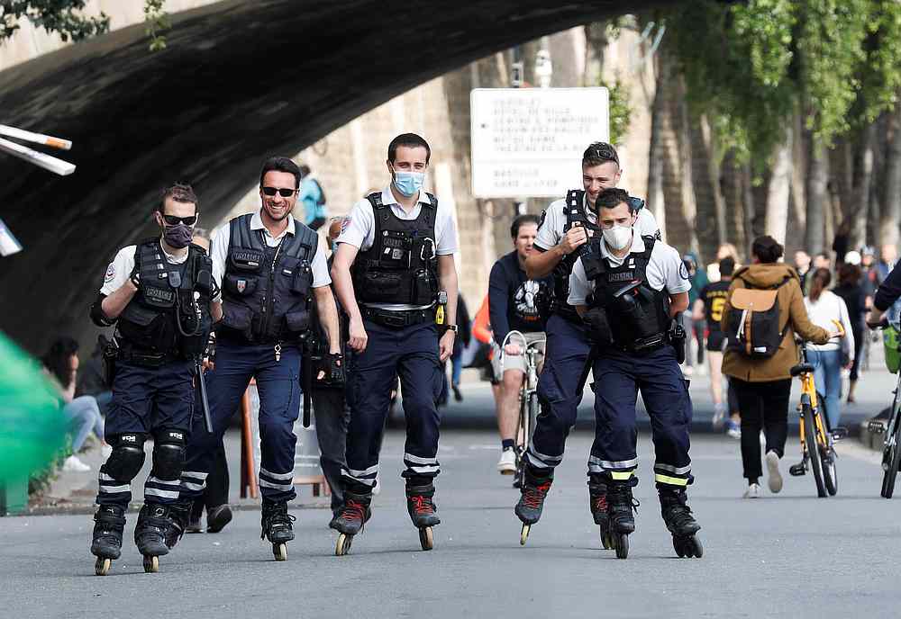 French police on rollerblades patrol along the banks of the Seine after France began a gradual end to a nationwide lockdown due to Covid-19 in Paris, France, May 13, 2020. u00e2u20acu201d Reuters pic