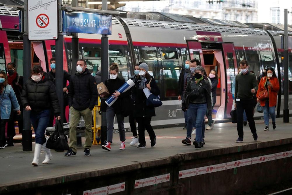 Commuters, wearing protective face masks, walk on a platform at the Saint-Lazare train station in Paris, on the first day mask usage is mandatory in public transport, after France begun a gradual end to a nationwide lockdown, May 11, 2020. u00e2u20acu201d Reuters pic