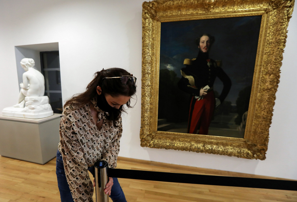A member of staff prepares exhibition rooms at The Musee Hyacinthe Rigaud in Perpignan on May 11, 2020, in readiness to receive visitors after the partial lifting of restrictions on movement in France. u00e2u20acu201d AFP pic 