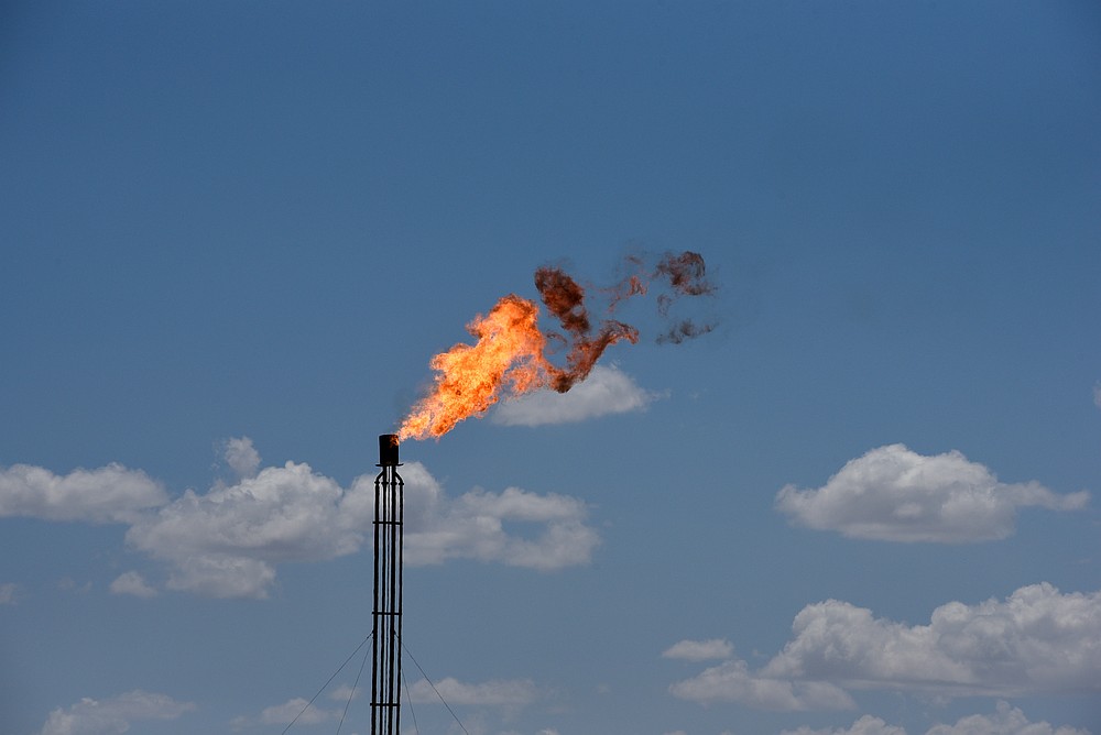 A flare burns off excess gas from a gas plant in the Permian Basin oil production area near Wink, Texas August 22, 2018. u00e2u20acu201d Reuters pic