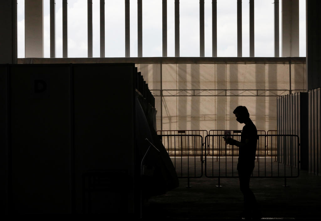A man wearing a protective face mask is seen at a new medical facility set up for testing migrant workers residing in dormitories for Covid-19 in Singapore. u00e2u20acu2022 Reuters pic
