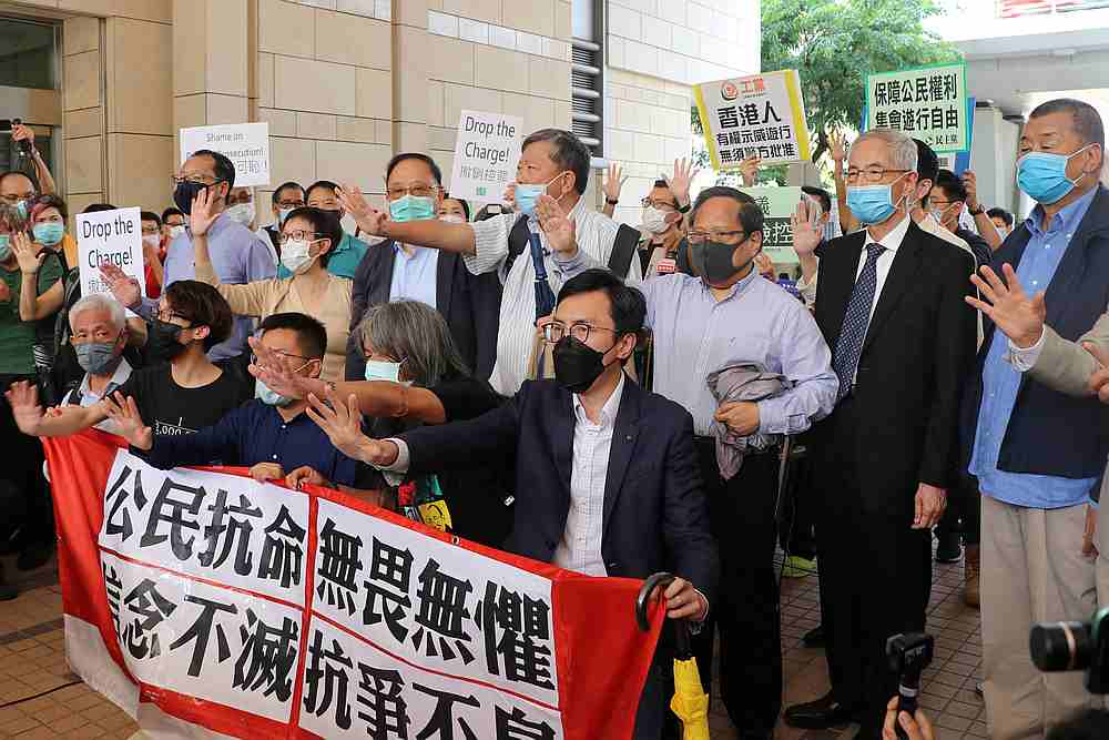 Pro-democracy activists chant slogans outside the West Kowloon Magistrates Court, in Hong Kong May 18, 2020. u00e2u20acu201d Reuters pic