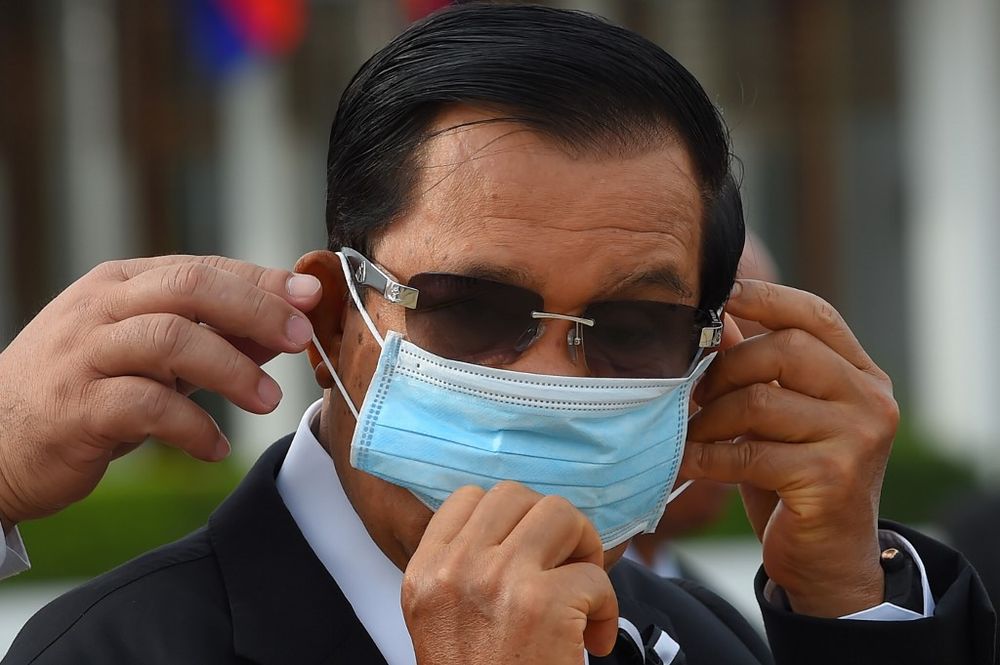 In this file photo taken on May 11, 2020 Cambodia's Prime Minister Hun Sen wears a face mask, as a preventive measure against the spread of the Covid-19 coronavirus, at Phnom Penh International Airport. u00e2u20acu201d AFP pic