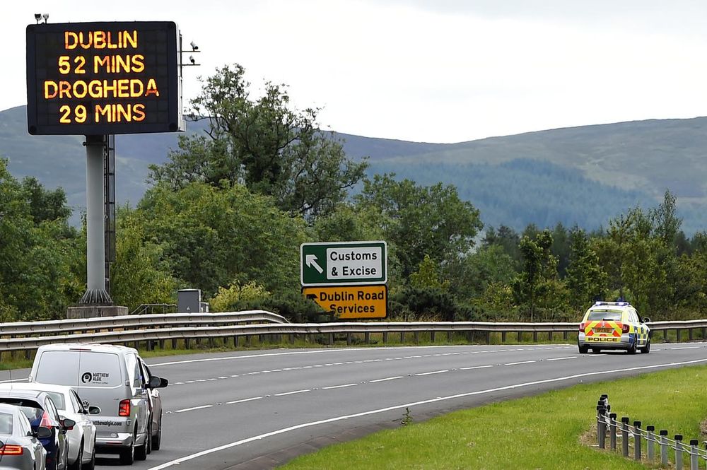 A police vehicle stops traffic beside a sign for customs and excise on the motorway approaching the border between Northern Ireland and Ireland, near Newry, Northern Ireland July 13, 2017. u00e2u20acu201d Reuters pic