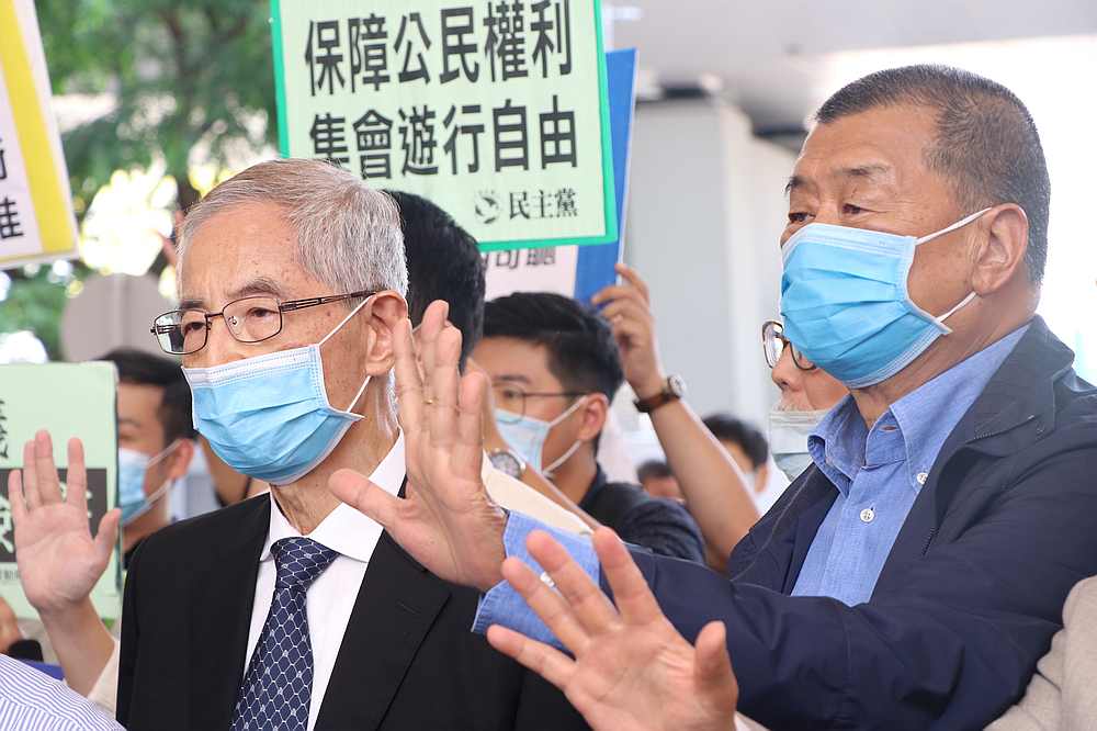 Founder of Hong Kong Democractic Party Martin Lee and Chairman of Next Media Ltd Jimmy Lai (right) arrive for a hearing at the West Kowloon Magistrates' Courts in Hong Kong May 18, 2020. u00e2u20acu201d Reuters pic