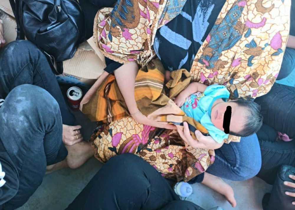 The three-day-old baby girl, together with her mother, were among 33 migrants detained in a fishing boat in the waters off Tanjung Balau in Kota Tinggi. u00e2u20acu201d Picture courtesy of Johor police