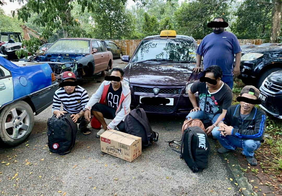 Migrants who were detained trying to illegally exit the country via Johor are pictured during u00e2u20acu02dcOp-Pintas Bersepadu Selatanu00e2u20acu2122. u00e2u20acu201d Picture courtesy of the Johor police