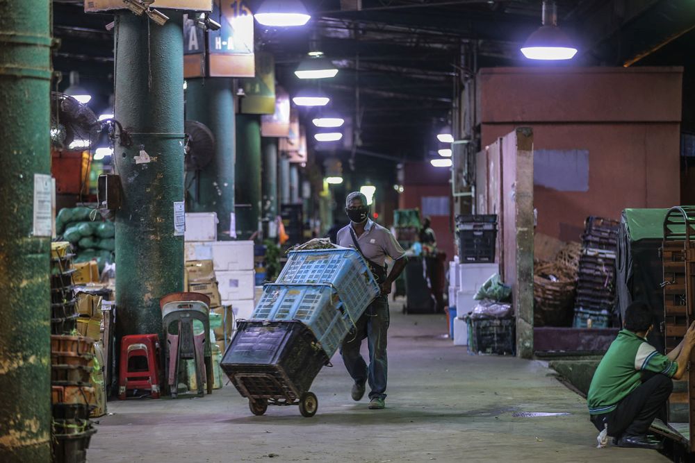 A general view of the Kuala Lumpur Wholesale Market as traders resumed business after the enhanced movement control order on the area was lifted on May 13, 2020. u00e2u20acu201d Picture by Hari Anggara